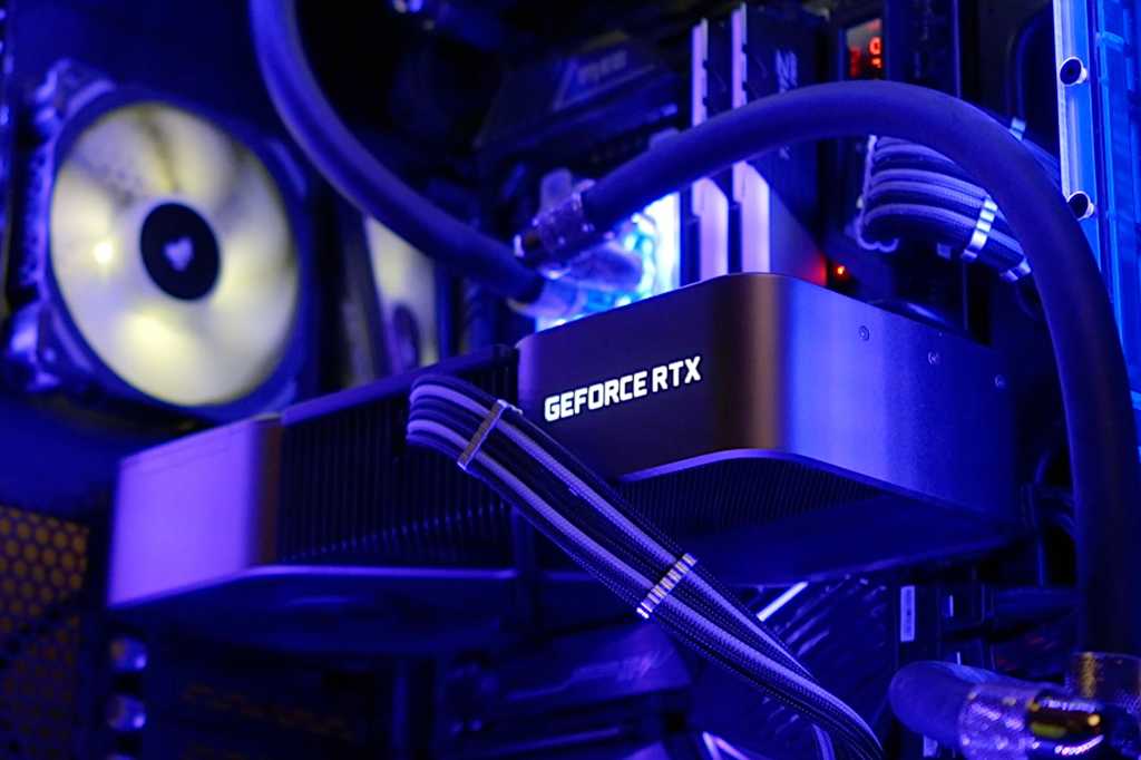 Nvidia GeForce RTX GPU graphics card in purple glowing desktop PC